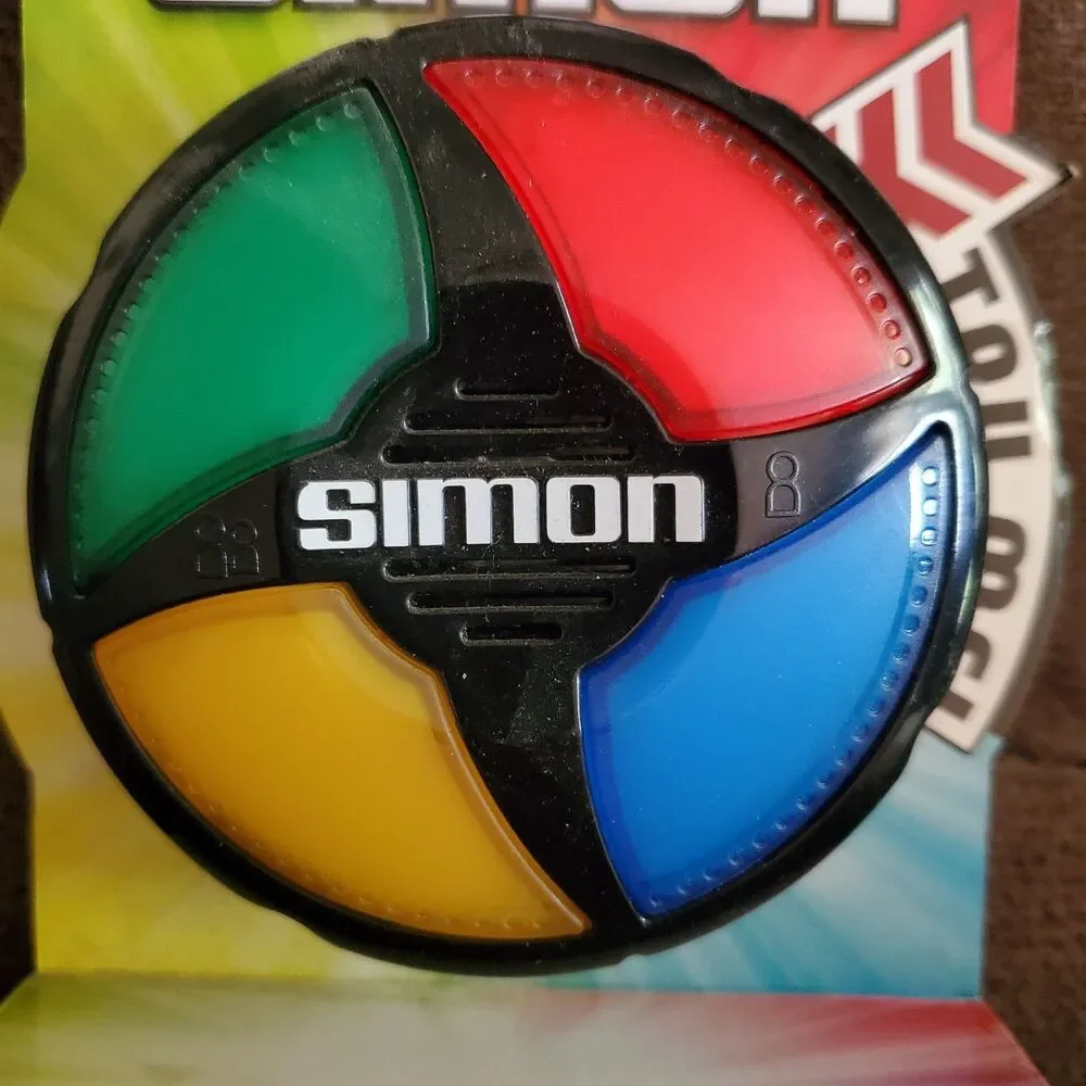 Hasbro Gaming Simon Micro Series Handheld Electronic Game 2014 New Sealed B0640
